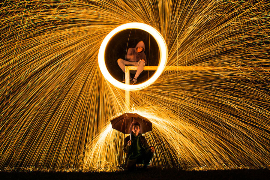 Energy being diverted with a boy holding umbrella